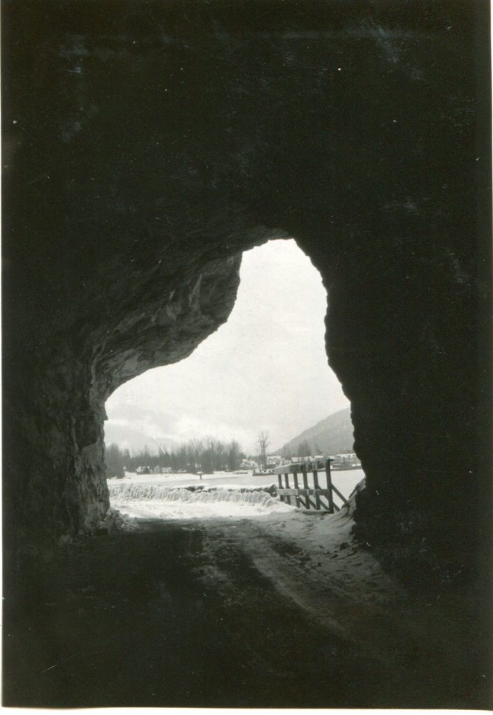 This photo taken from inside the tunnel shows Slocan in the distance, circa 1933
